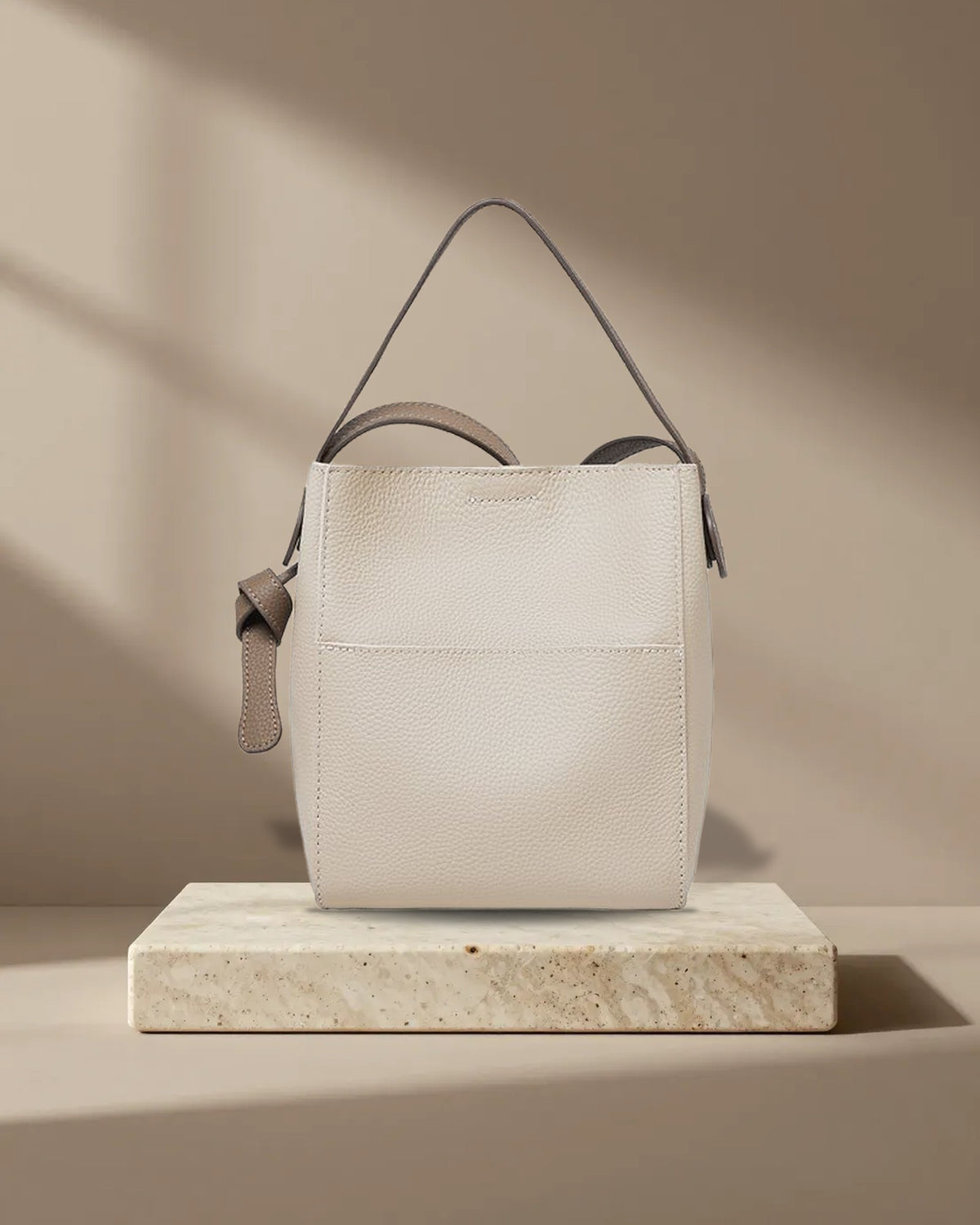 Pebbled Leather Bucket Bag in Ivory, picture 1 of 8