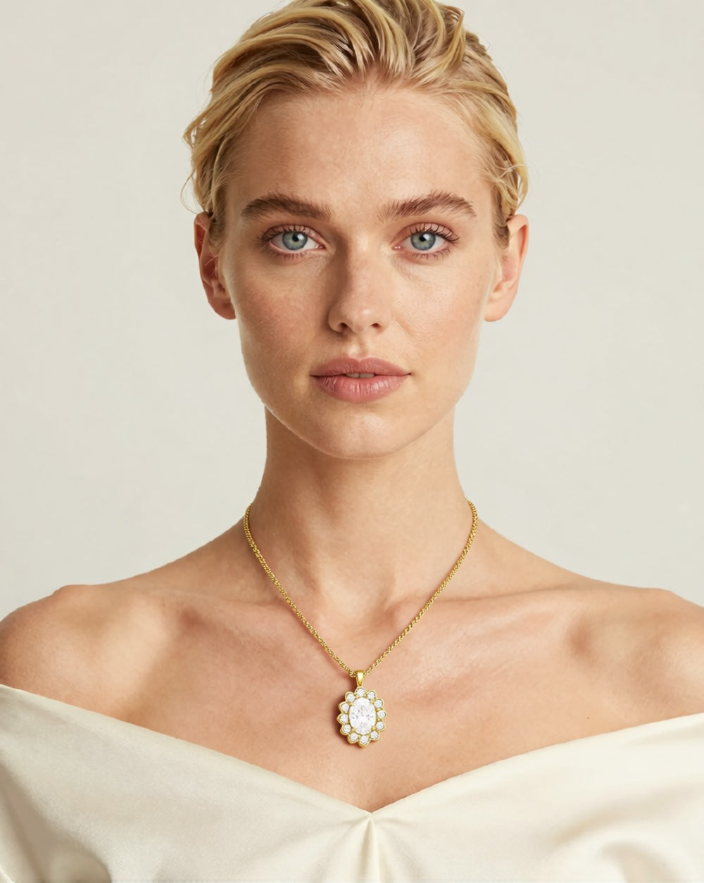 BOSCONA gold necklace with clear zircon oval pendant worn by model